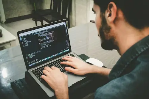 A man working on his laptop